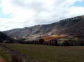 The village of Les Cuns with the Causse du Larzac above - Castel de Cantobre G&icirc;tes, Aveyron, France