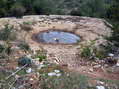 A Lavogne (water basin) on the Causse de Larzac - Castel de Cantobre G&icirc;tes, Aveyron, France